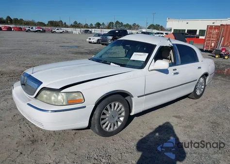2004 Lincoln Town Car Signature из США, поврежденный, VIN 1LNHM81W74Y623806
